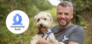 Head Vet Sean and Bear celebrate the tails.com Community Fund