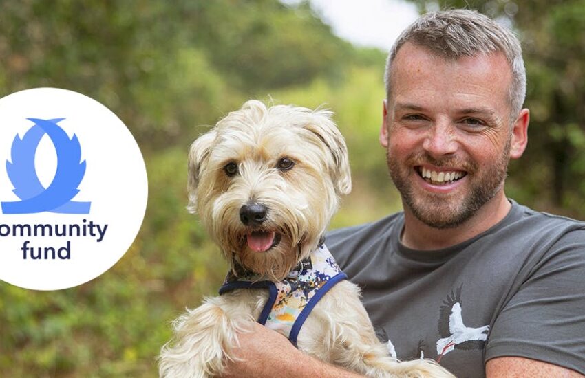 Head Vet Sean and Bear celebrate the tails.com Community Fund