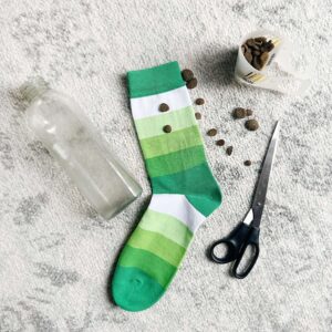 Homemade dog puzzle toy using a sock and a water bottle